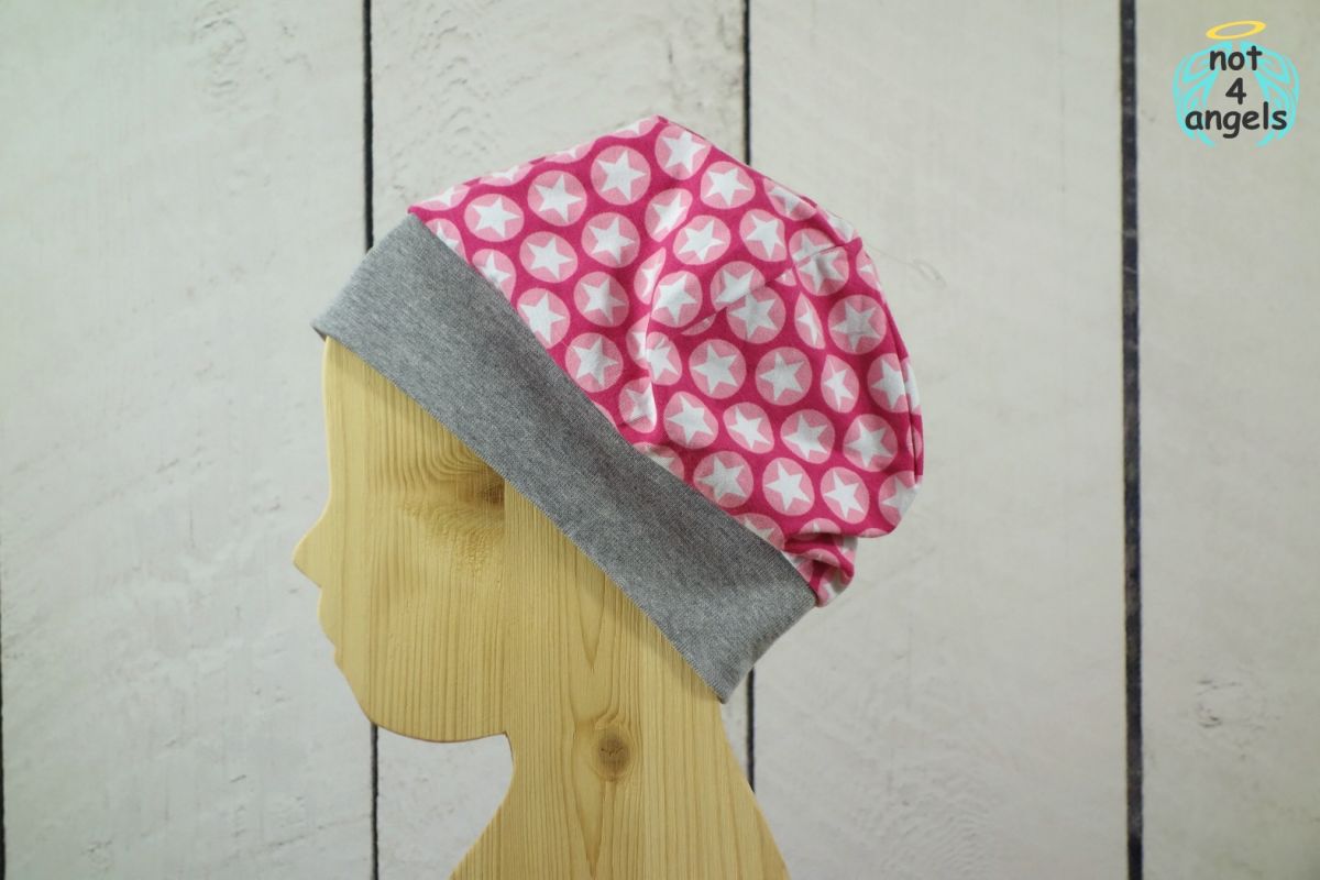 Mütze Sterne im Kreis pink