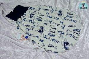 Strampelsack Pinguine blau auf ecru